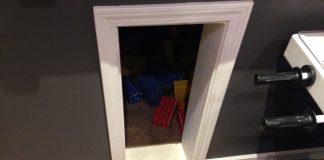 Kid’s playroom under the stairs in the game room Playroom under the stairs with the lights off