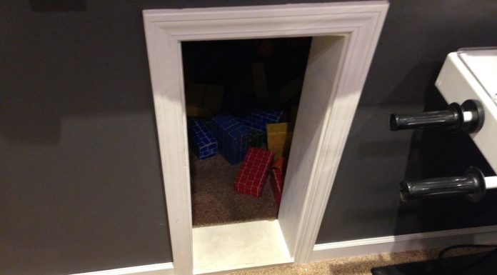Kid’s playroom under the stairs in the game room Playroom under the stairs with the lights off