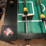 wood block used to add and remove foosball players
